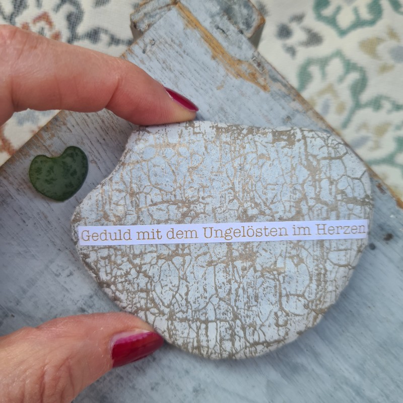 Geduld auf einem Stein